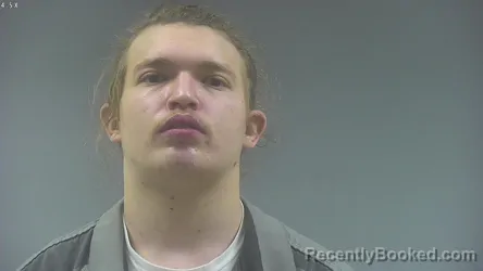 Mugshot of KADDAN ALAN MILLS booked in Washington County, Iowa on April 2, 2026