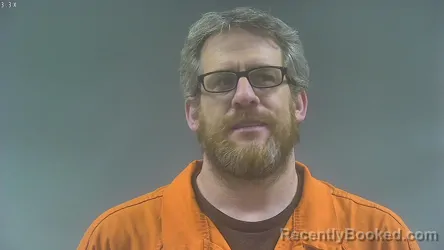 Mugshot of DAVID JOSEPH JOHNSON booked in Washington County, Iowa on April 13, 2026