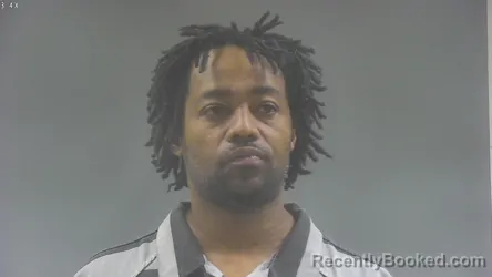 Mugshot of CHARLES HESTON SMITH booked in Washington County, Iowa on April 15, 2026