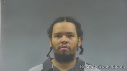 Mugshot of ALEXSANDEL RIVAS MARTINEZ booked in Washington County, Iowa on April 27, 2026