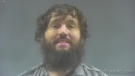 Mugshot of QUENTIN NATHANIEL QUEEN booked in Washington County, Iowa on June 15, 2026