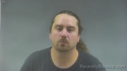 Mugshot of ISAC BENJAMIN PETTINGER booked in Washington County, Iowa on August 1, 2026