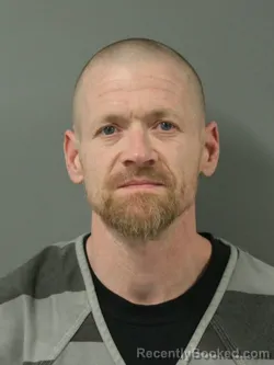 Mugshot of JOSHUA DEAN CARLE booked in Webster County, Iowa on March 21, 2026