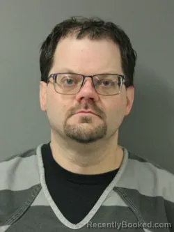 Mugshot of DUSTIN LYNN RHOAD booked in Webster County, Iowa on April 29, 2026
