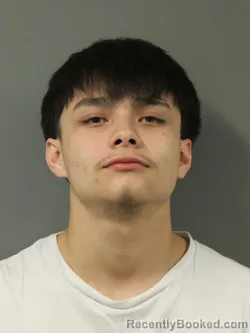 Mugshot of DAYN FABIAN MUNIZ booked in Webster County, Iowa on April 23, 2026