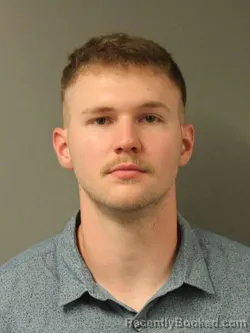 Mugshot of Austin Neil Prewitt booked in Webster County, Iowa on August 21, 2026