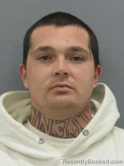 Mugshot of ALEXZANDER IAN CARTER booked in Winnebago County, Iowa on March 30, 2026