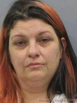 Mugshot of TIFFANY ANN WEST booked in Winnebago County, Iowa on April 12, 2026