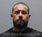 Mugshot of Devon Corey Moore booked in Pickens County, South Carolina on August 13, 2026