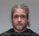 Mugshot of JUSTIN DAVIS FLORES