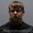 Mugshot of Joshua Robert Reynolds booked in Pickens County, South Carolina on August 12, 2026