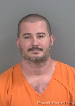 Mugshot of ROBERT MILLER HENDERSON booked in Collier County, Florida on March 18, 2026