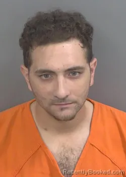 Mugshot of JUSTIN IVAN GOMEZ booked in Collier County, Florida on March 18, 2026