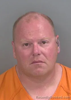 Mugshot of TRAVIS LEON BURKE booked in Collier County, Florida on March 27, 2026