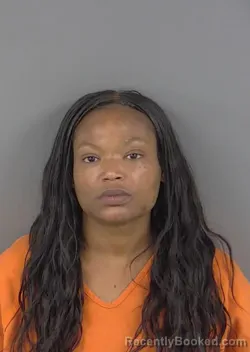 Mugshot of SHAQUOUNDA LATRICE HUGHES booked in Collier County, Florida on March 27, 2026