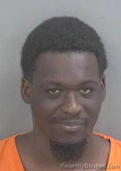 Mugshot of OBED JUNIOR CALIXTE booked in Collier County, Florida on May 3, 2026