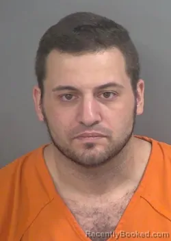 Mugshot of SPENCER CRAIG GARRIDO-ALVAREZ booked in Collier County, Florida on May 14, 2026