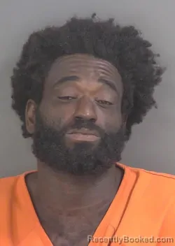 Mugshot of Cortez Marquis Burgess booked in Collier County, Florida on August 27, 2026