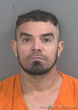 Mugshot of Juan Escobar booked in Collier County, Florida on August 28, 2026