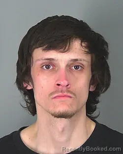 Mugshot of KYLE SCOGGINS