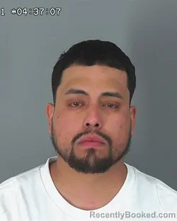 Mugshot of JUAN MARTINIEZ-CRUZ