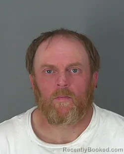 Mugshot of REGGIE ROBINSON booked in Spartanburg County, South Carolina on March 14, 2026