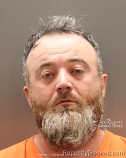 Mugshot of Brett Scott Gilman booked in Ada County, Idaho on August 14, 2026