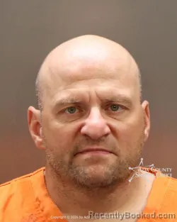 Mugshot of Charles Eugene Burk booked in Ada County, Idaho on May 22, 2026