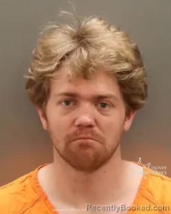 Mugshot of Benjamin Cooper Olson booked in Ada County, Idaho on May 13, 2026