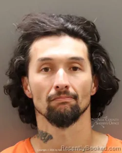 Mugshot of Derick Chauncey Hodgins booked in Ada County, Idaho on May 21, 2026