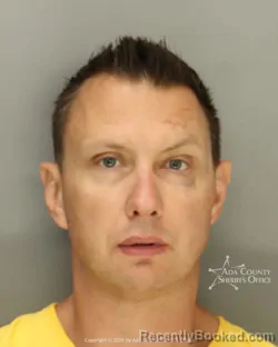 Mugshot of Christopher Robert Honomichl booked in Ada County, Idaho on August 26, 2026