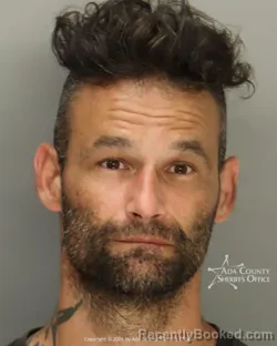 Mugshot of Dustin Ray Trammel booked in Ada County, Idaho on October 2, 2026