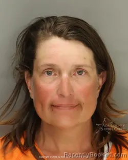 Mugshot of Jennifer Mae Bell booked in Ada County, Idaho on July 7, 2026
