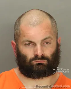 Mugshot of Matthew Robert Hugill booked in Ada County, Idaho on May 14, 2026