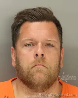 Mugshot of Michael Henry Cunningham booked in Ada County, Idaho on August 25, 2026