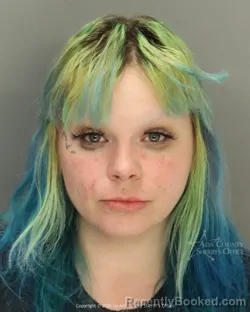 Mugshot of Catherine Anne Holmes booked in Ada County, Idaho on March 28, 2026