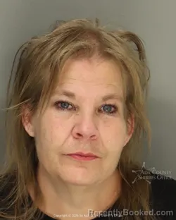 Mugshot of Kelly Suzanne Treat booked in Ada County, Idaho on August 28, 2026