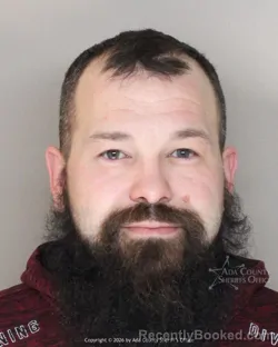 Mugshot of Adam Bain booked in Ada County, Idaho on March 29, 2026