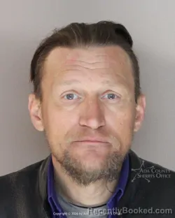 Mugshot of John Edward Hurley booked in Ada County, Idaho on March 26, 2026