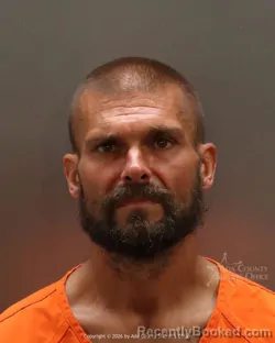 Mugshot of Michael Ray Ronjoin booked in Ada County, Idaho on March 25, 2026