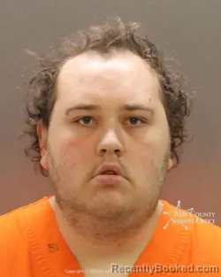 Mugshot of Aaron James Holt booked in Ada County, Idaho on August 14, 2026