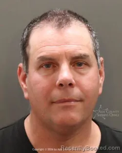 Mugshot of Benjamin Charles Burch booked in Ada County, Idaho on October 14, 2026
