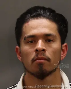 Mugshot of Joshua Alexis Escobar booked in Ada County, Idaho on May 10, 2026
