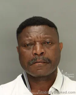 Mugshot of Vincent Mukokya booked in Ada County, Idaho on March 16, 2026