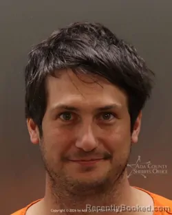 Mugshot of Joshua Jonathan Grad booked in Ada County, Idaho on March 18, 2026