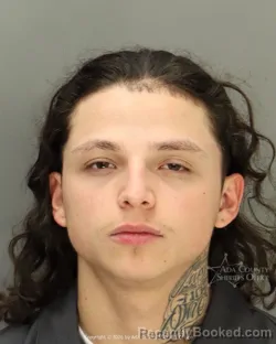 Mugshot of Adam Javier Burgos