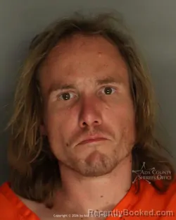 Mugshot of Dustin Laban Smith booked in Ada County, Idaho on March 12, 2026