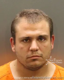 Mugshot of Maksim Saakov booked in Ada County, Idaho on April 16, 2026