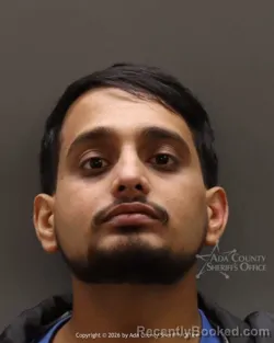 Mugshot of Atharva Uday Thipsay booked in Ada County, Idaho on March 8, 2026