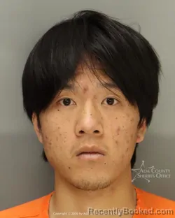 Mugshot of Xiang Huang booked in Ada County, Idaho on March 18, 2026